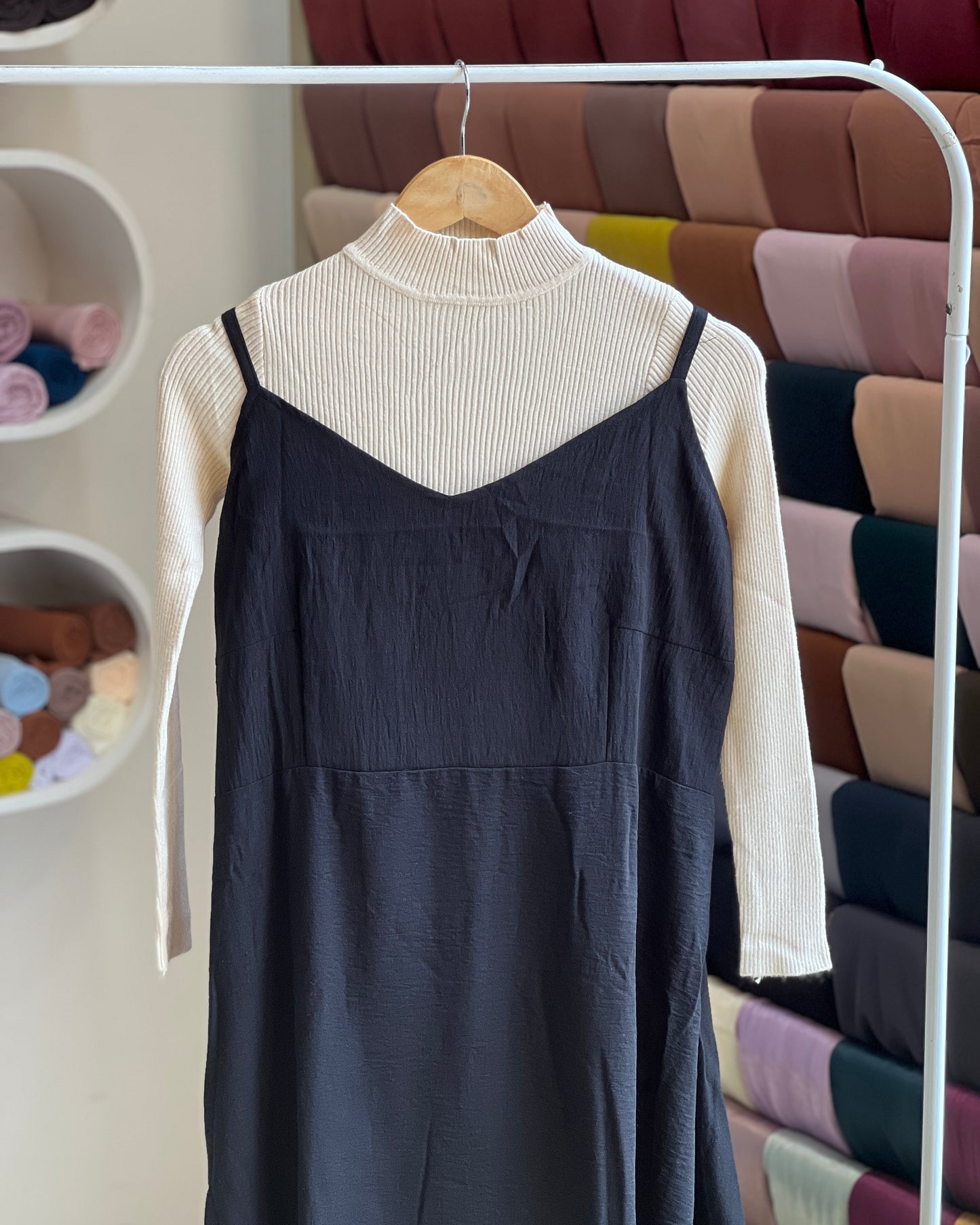 Black embroidered pinafore with off white inner