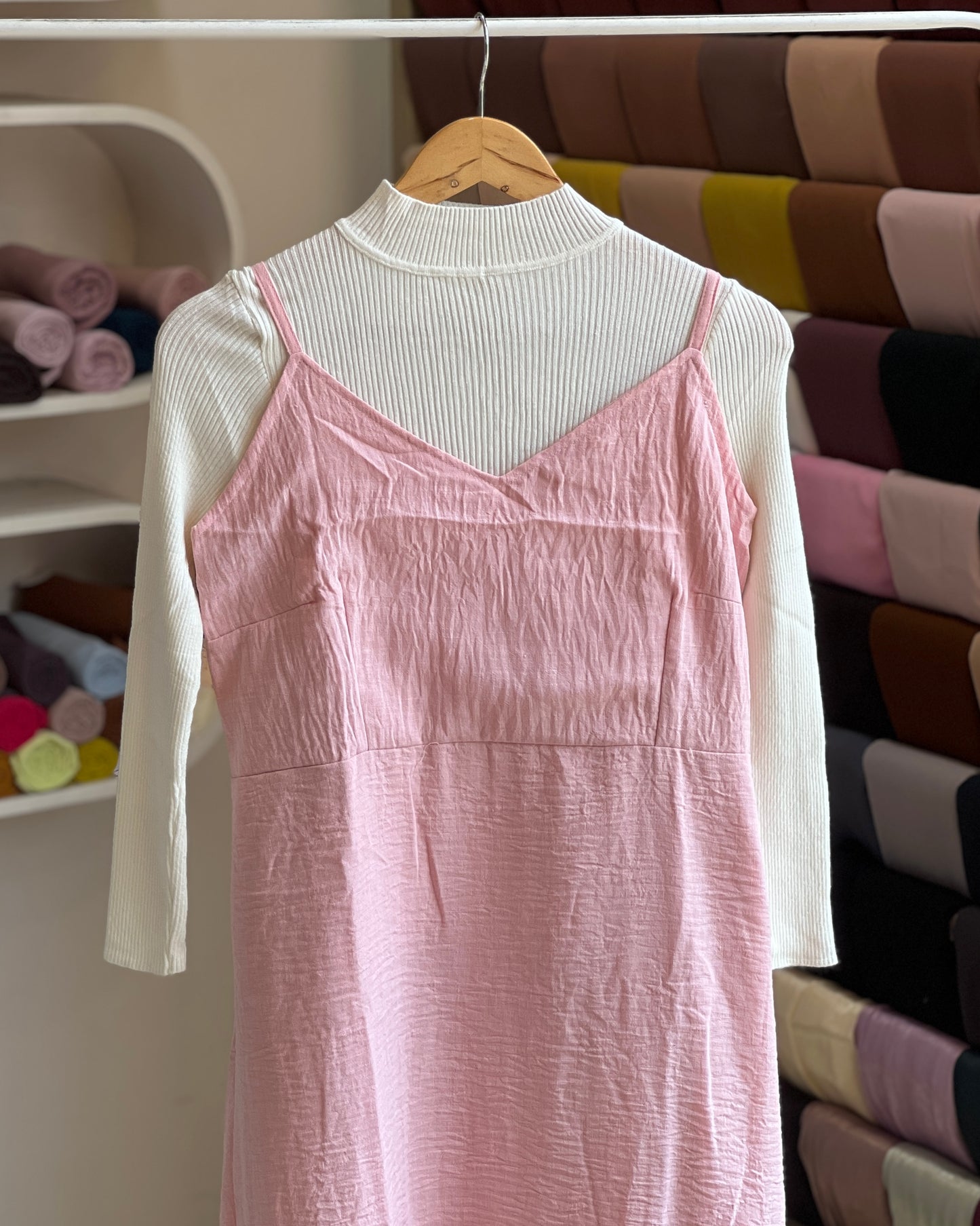 Light pink embroidered pinafore with white inner