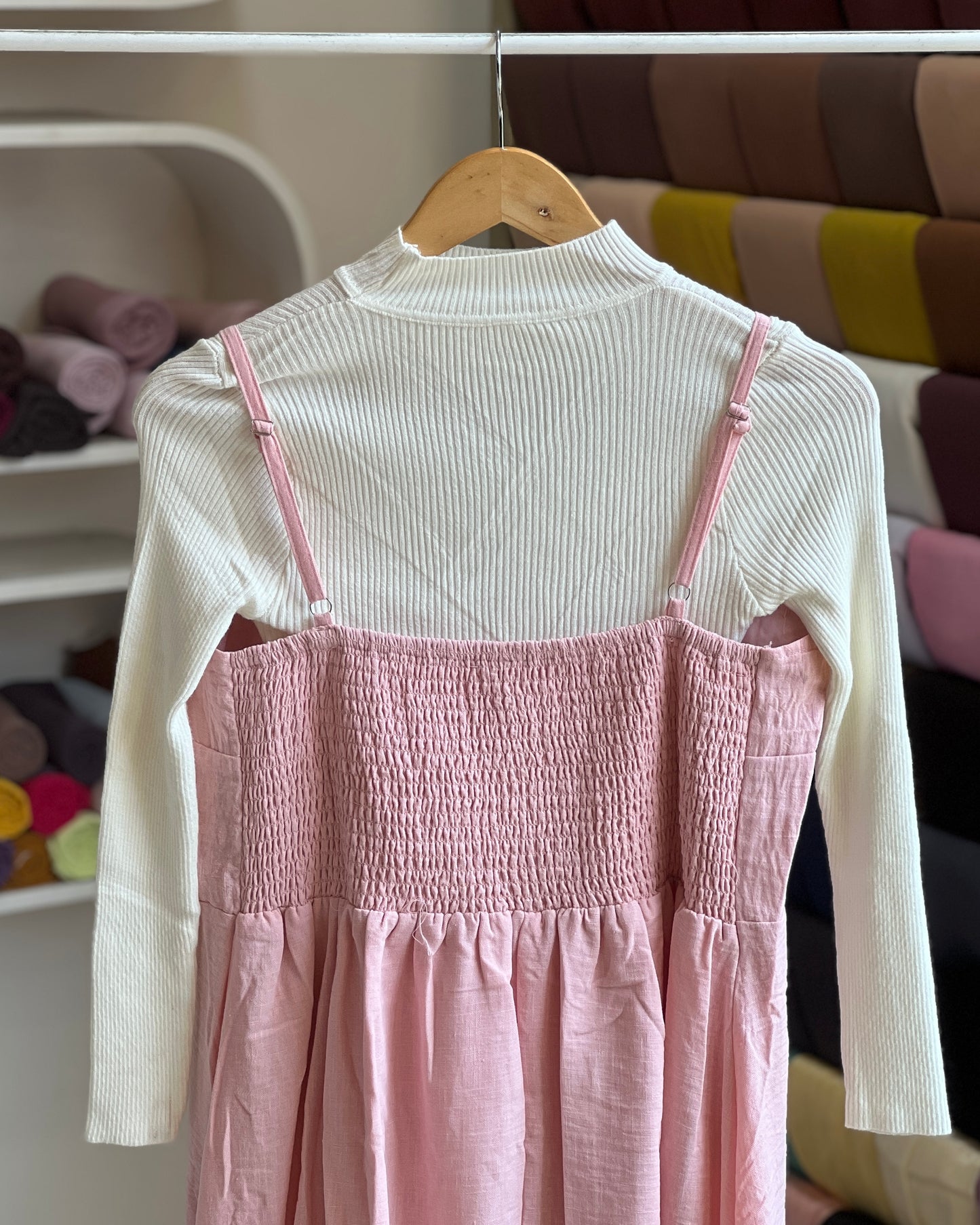 Light pink embroidered pinafore with white inner