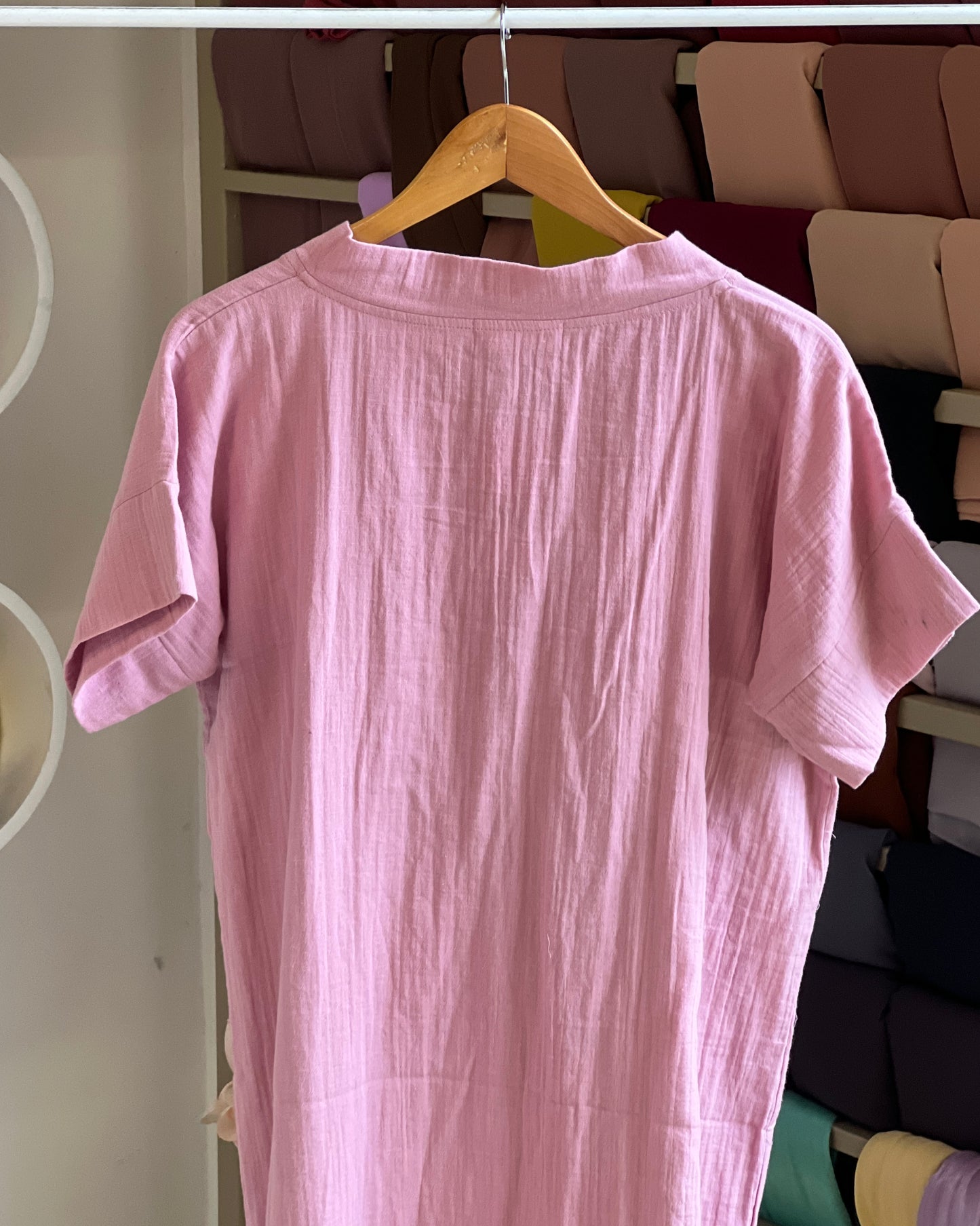 Women’s light pink v-neck tunic top