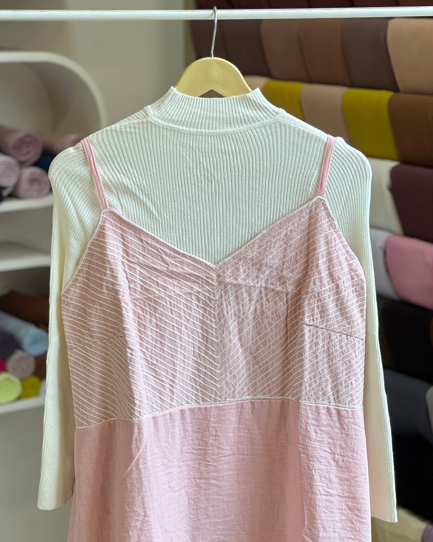 Light pink embroidered pinafore with white inner