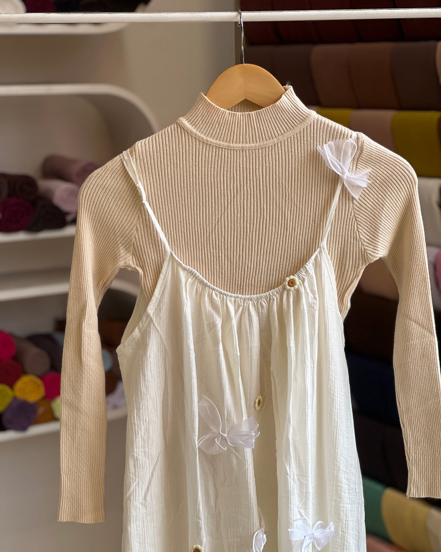Women’s off-white imported pinafore