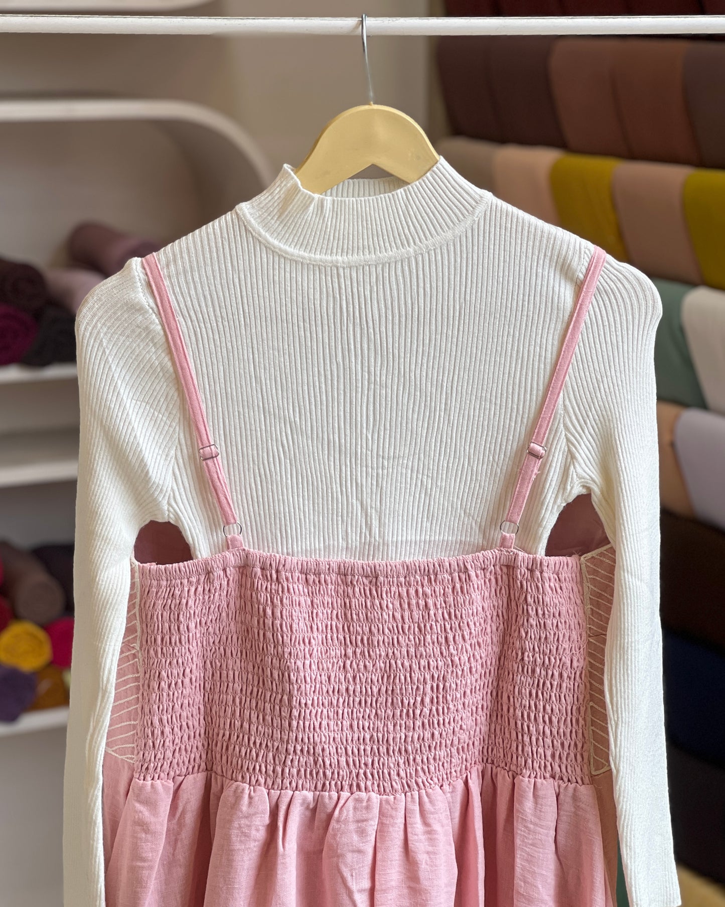 Light pink embroidered pinafore with white inner