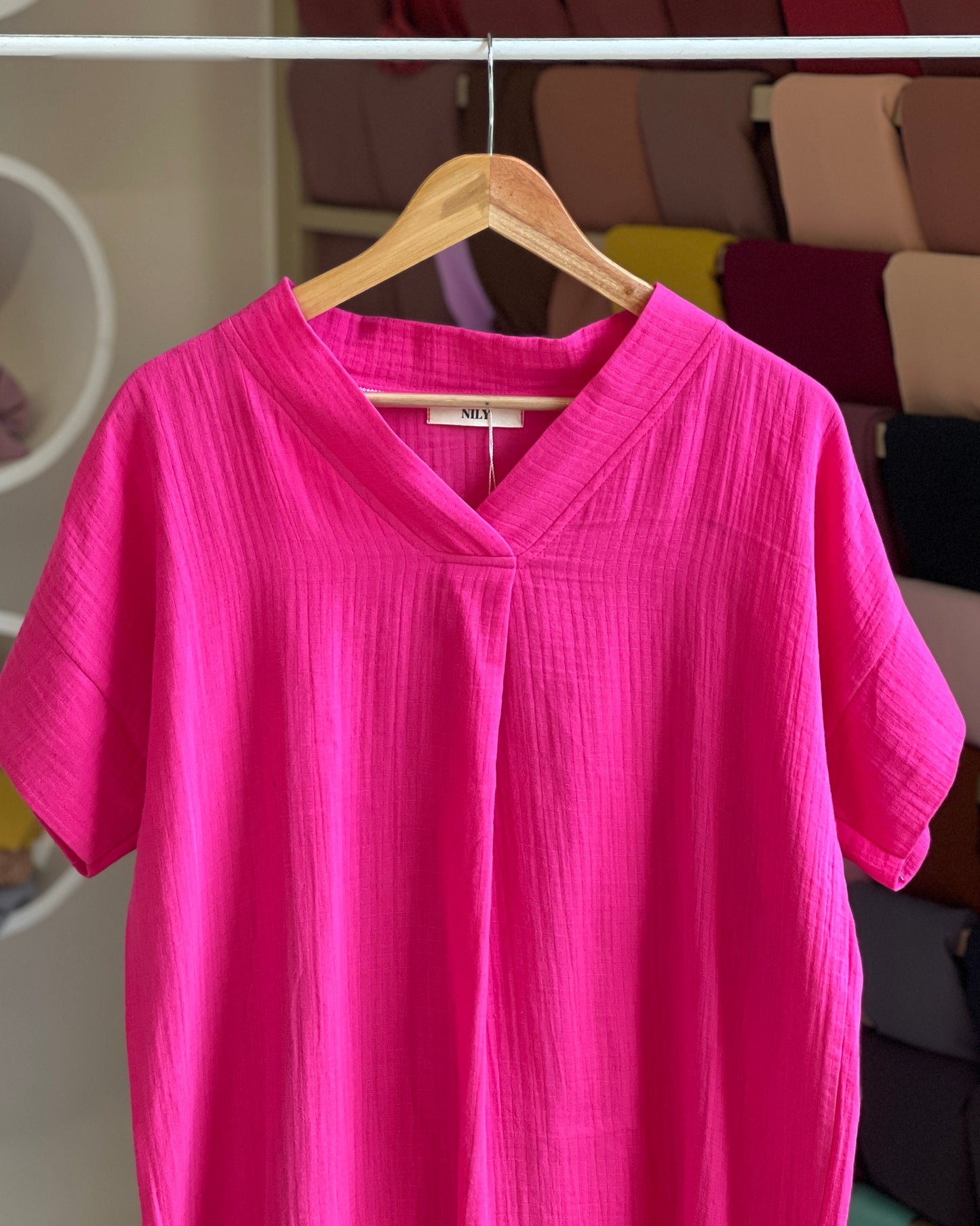 Women’s pink v-neck tunic top