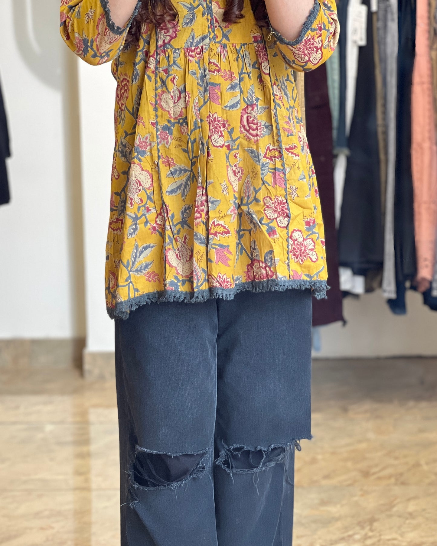 Women short yellow printed Kurti
