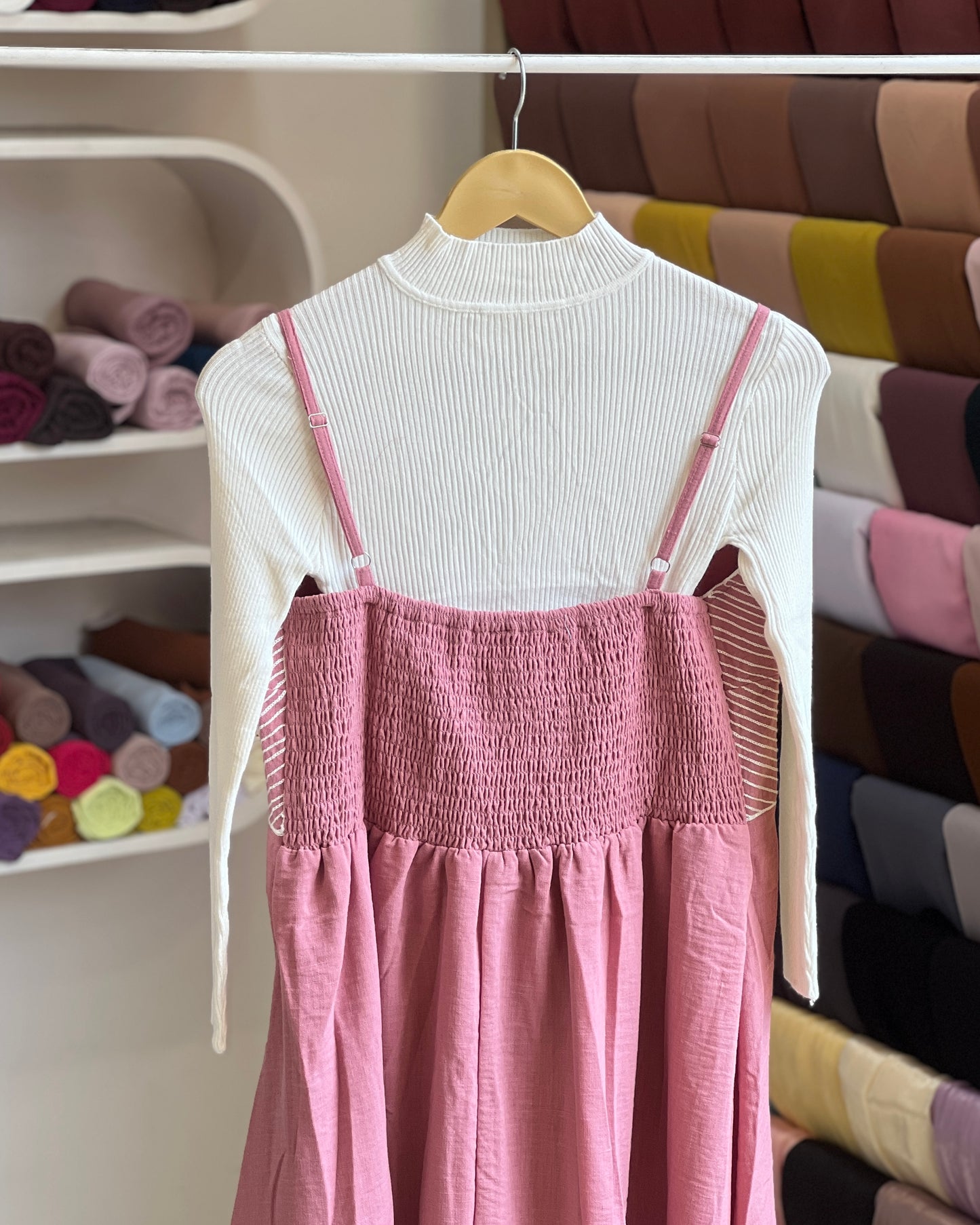 Pink embroidered pinafore with off white inner