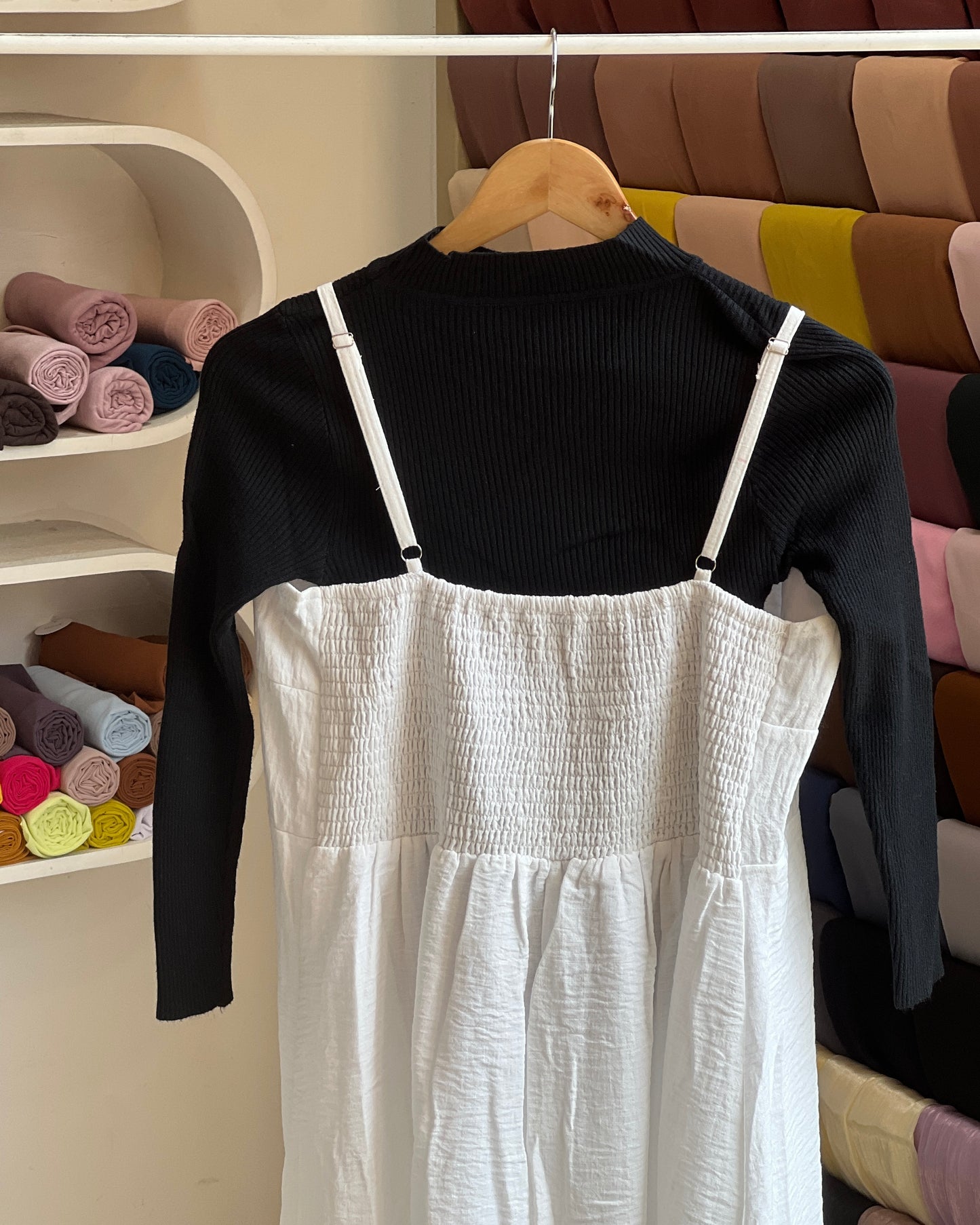 White embroidered pinafore with black inner