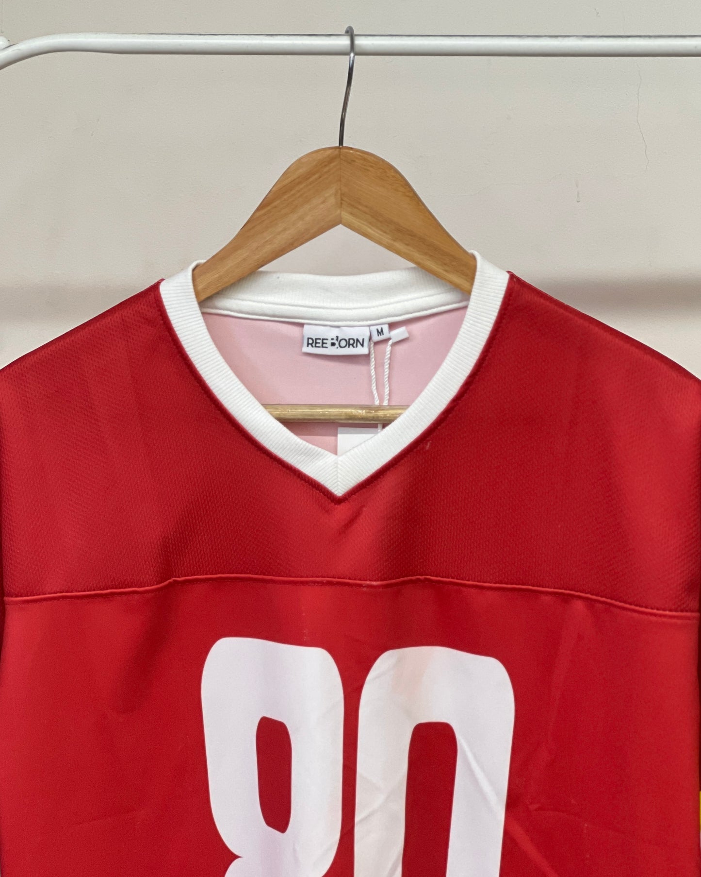 Tela by ash women red v-neck jersey