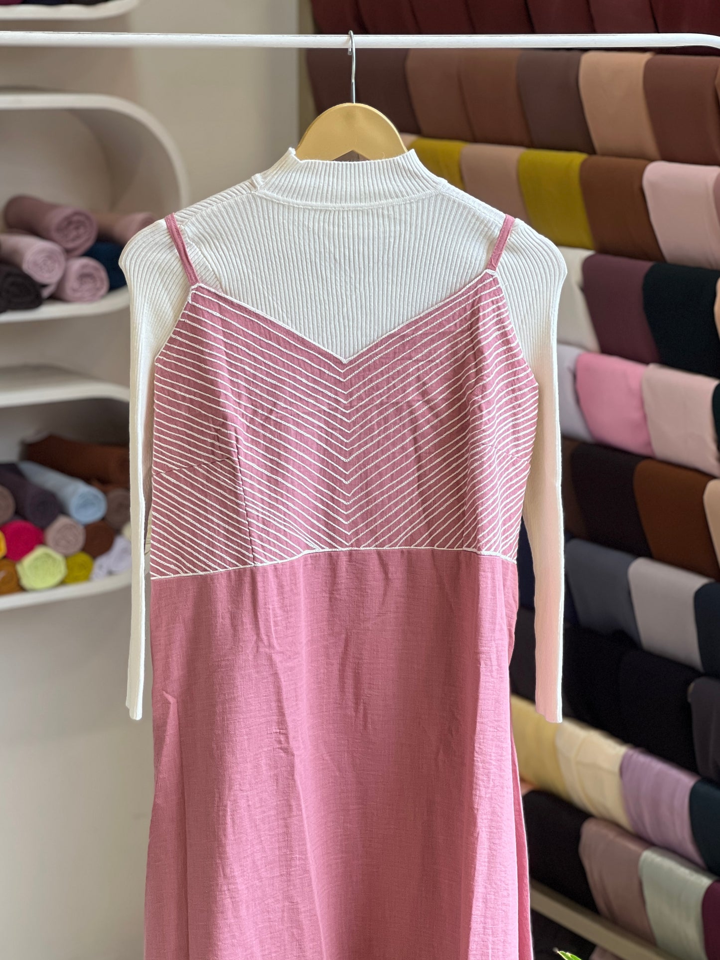 Pink embroidered pinafore with off white inner