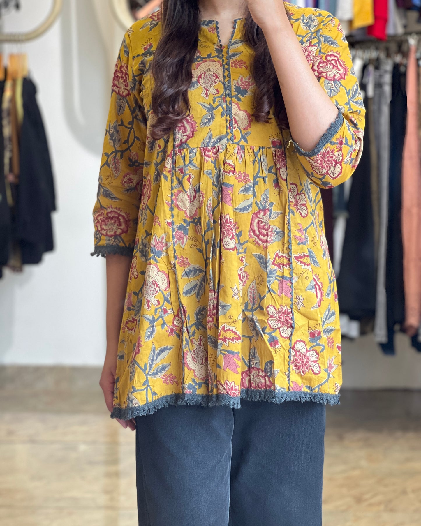 Women short yellow printed Kurti