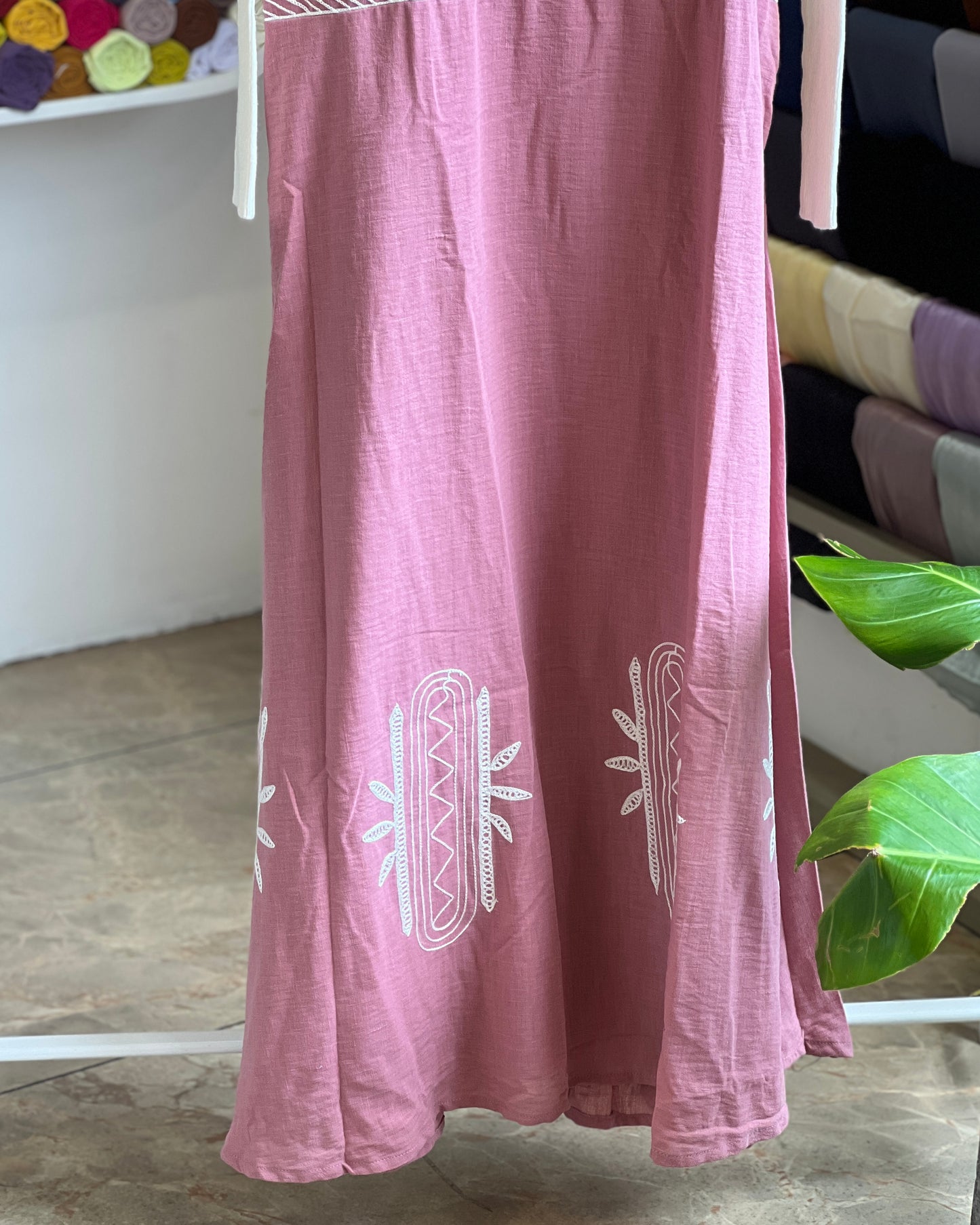 Pink embroidered pinafore with off white inner