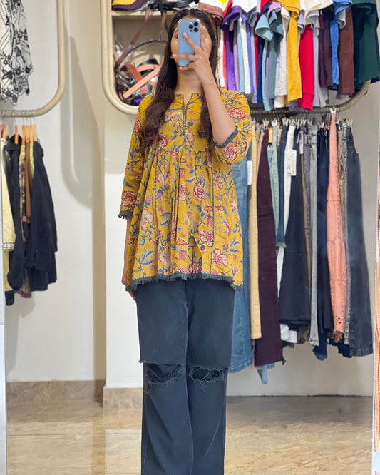 Women short yellow printed Kurti