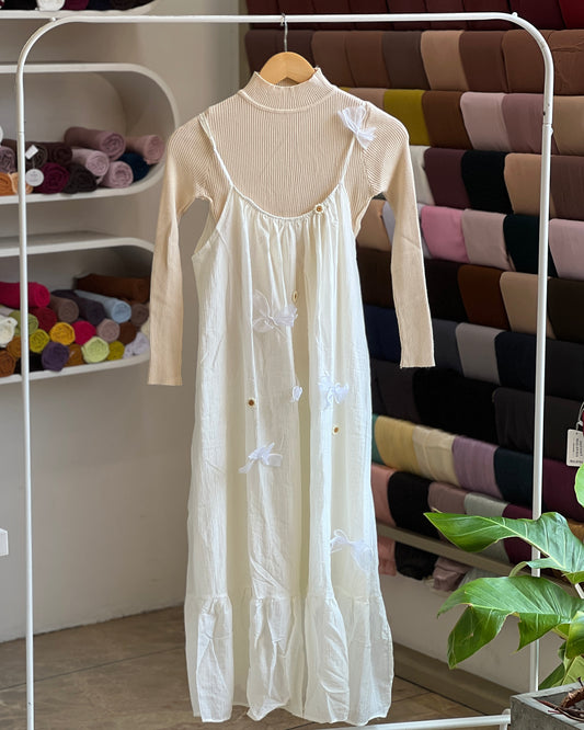 Women’s off-white imported pinafore