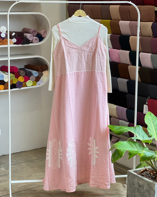 Light pink embroidered pinafore with white inner