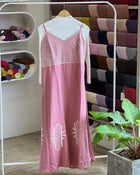 Pink embroidered pinafore with off white inner