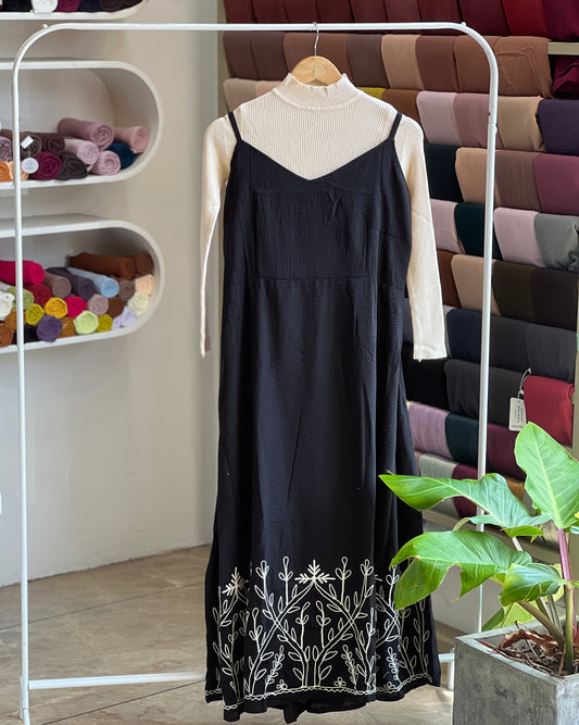 Black embroidered pinafore with off white inner